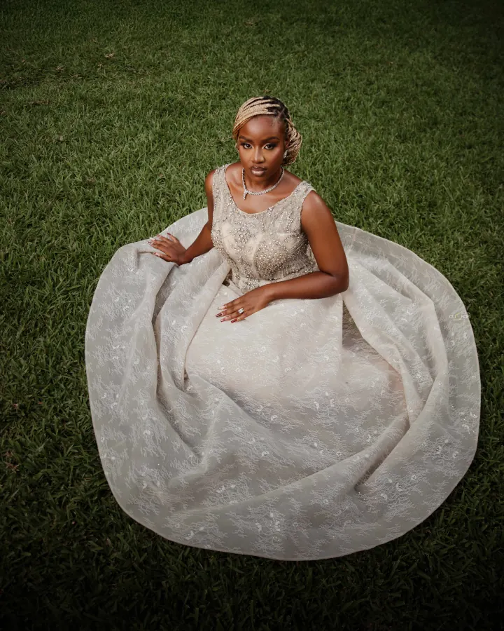 Bride seated in beaded gown